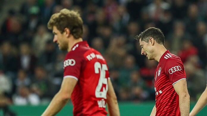 Niedergeschlagen: Die Bayern-Stars Thomas Müller (l.) und Robert Lewandowski.