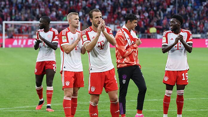 Harry Kane (m.) feierte ein gelungenes Bundesliga-Heimdebüt gegen Augsburg.
