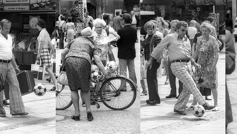 Die Münchner sind fast ein bisserl fußballnarrisch: In der Neuhauser und Kaufingerstraße ist Public Kicking angesagt. Aktentaschen, Koffer oder Radl erweisen sich dabei als nur wenig hinderlich.
