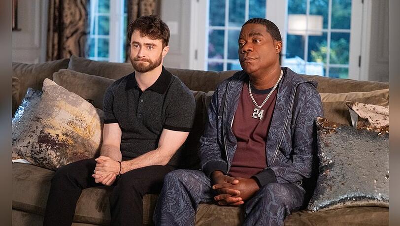 M&uuml;ssen sich erst noch zusammenraufen: Filmemacher Arthur Tobin (Daniel Radcliffe, li.) und das Subjekt seiner Dokumentation, der gefallene Ex-Footballprofi Reggie Dinkins (Tracy Morgan).