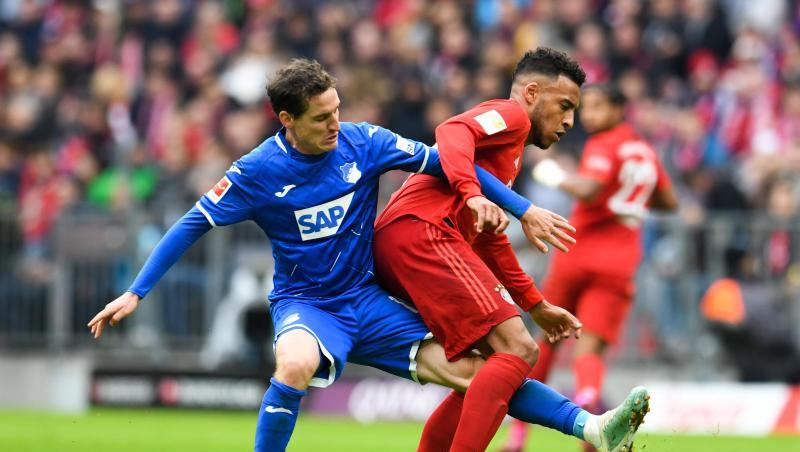 Sebastian Rudy (l) von Hoffenheim und Corentin Tolisso von Bayern kämpfen am 05.10.2019 um den Ball. Foto: Tobias Hase/dpa/Archivbild Sebastian Rudy (l) von Hoffenheim und Corentin Tolisso von Bayern kämpfen am 05.10.2019 um den Ball. Foto: Tobias Hase/dpa/Archivbild