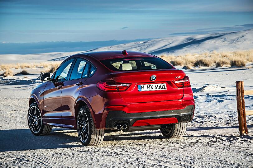 Noch so einer, nur kleiner: BMW stellt dem opulenten X6 mit dem X4 eine schmächtigere, aber immer noch massige Variante eines SUV-Coupés zur Seite.