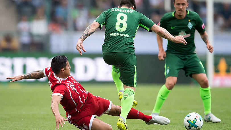 Erfolgreiches Tackling von James Rodriguez.