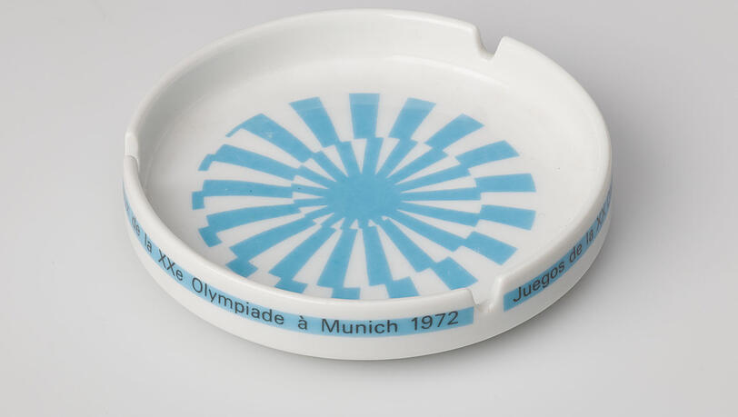 Die hellblaue Olympia-Sonne hat selbst aus Aschenbechern geleuchtet. Die hellblaue Olympia-Sonne hat selbst aus Aschenbechern geleuchtet.