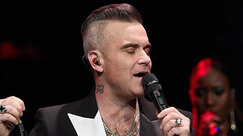 Robbie-Williams-Fans waren schnell. Das Deutschland-Konzert im kommenden Jahr war innerhalb einer halben Stunde ausverkauft. (Symbolbild)