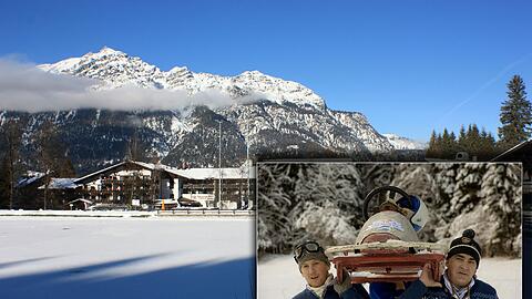 Im Hintergrund das Hotel Riessersee, vorne: Teilnehmer beim Red Bull Bob Heroes Rennen.