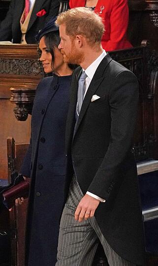 Prinz Harry und seine Frau Herzogin Megan kommen zur Hochzeit von Prinzessin Eugenie und Jack Brooksbank an der St.-Georges-Kapelle von Schloss Windsor an.