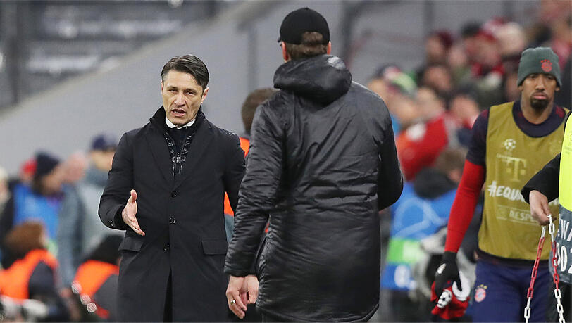 Geschlagen: Niko Kovac (li.) von Jürgen Klopp (Mi.) in der Champions League. Geschlagen: Niko Kovac (li.) von Jürgen Klopp (Mi.) in der Champions League.