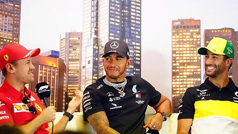 Fiebern dem Start der Formel 1 entgegen: Sebastian Vettel (l-r), Lewis Hamilton und Daniel Ricciardo.