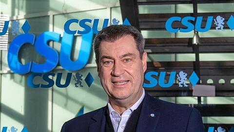 Markus Söder (CSU)steht vor Mikrofonen. Foto: Peter Kneffel/dpa/Archivbild