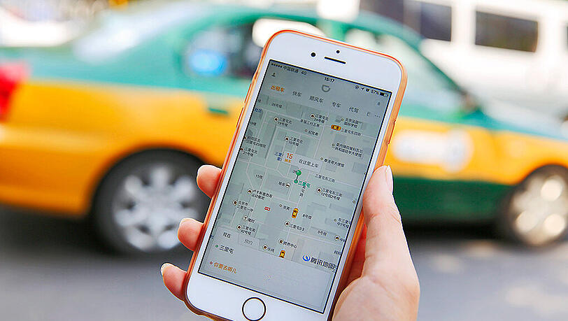 Das Fahrdienst-Geschäft in China ist heiß umkämpft. Foto: How Hwee Young/Illustration Das Fahrdienst-Geschäft in China ist heiß umkämpft. Foto: How Hwee Young/Illustration