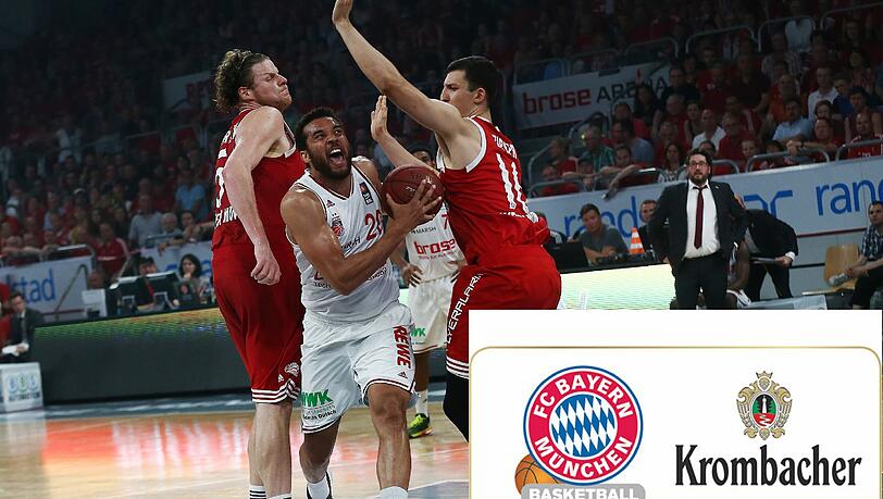 Der Bamberger Elias Harris tankt sich durch die beiden Münchner John Bryant (links) und Paul Zipser hindurch.