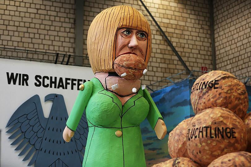 ... und auch Angela Merkel und ihr "Wir schaffen das" wird Teil der Motivwagen sein.