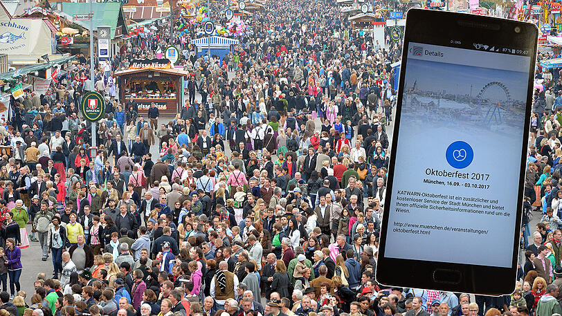 Sicherheitsinfos rund um die Wiesn werden über die "Katwarn"-App ausgespielt.