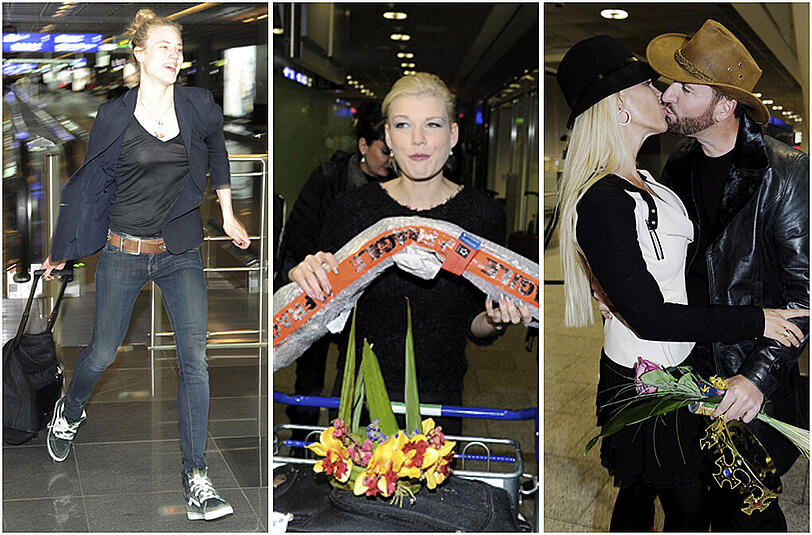 Larissa hat sichtlich ihren BH vergessen, Melanies Zepter zerbricht auf dem Flug und der Wendler ziert sich beim Begrüßungs-Kuss. Die Bilder von der Flughafen-Ankunft der Dschungelcamp-Stars...