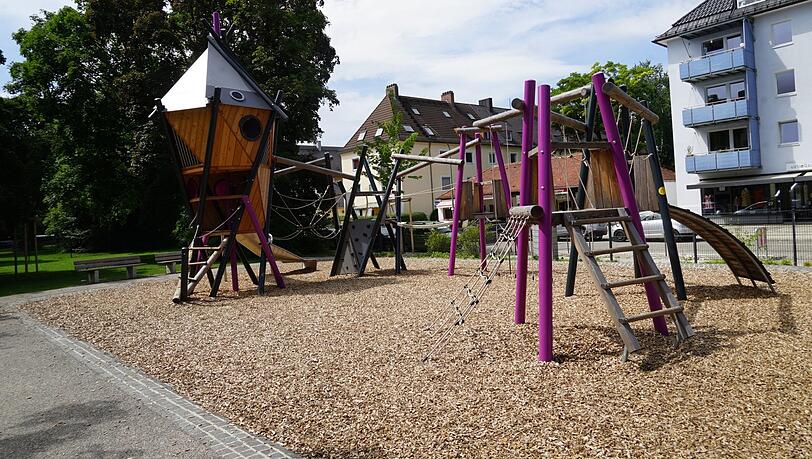 Die Grünanlage mit Spielplatz am Scharfreiterplatz.