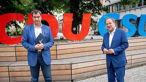 Der CSU-Vorsitzende Markus Söder (l) und der CDU-Bundesvorsitzende Armin Laschet.