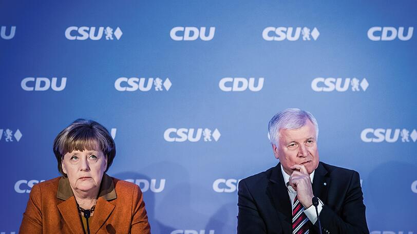 Bundeskanzlerin Angela Merkel (CDU) und der bayerische Ministerpräsident Horst Seehofer (CSU) bei einer Pressekonferenz im Februar in München - das Motiv ist Sieger in der Kategorie Tagesaktualität.