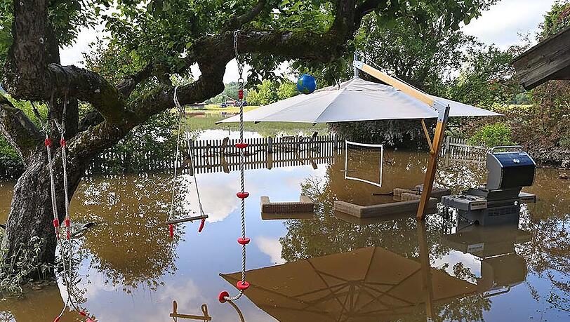 Dieses Bild vom vergangenen Montag zeigt einen Garten im oberbayerischen Polling nach dem Hochwasser. (Archivbild) Dieses Bild vom vergangenen Montag zeigt einen Garten im oberbayerischen Polling nach dem Hochwasser. (Archivbild)