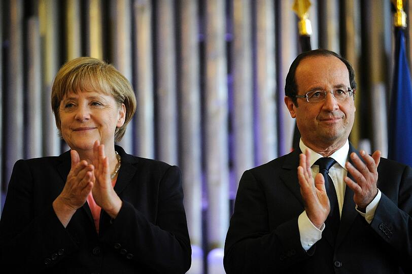 Merkel und Hollande feiern in Reims deutsch-französische Freundschaft. Die Bilder