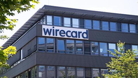 Der Schriftzug von Wirecard ist an der Firmenzentrale zu sehen. Foto: Sven Hoppe/dpa/Symbolbild