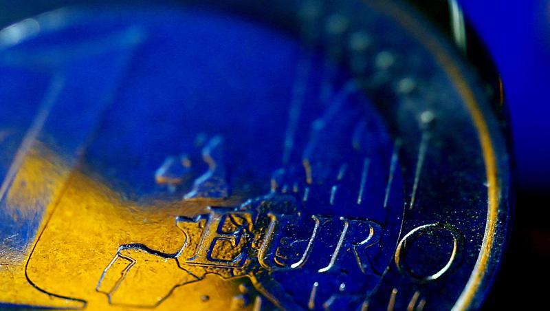 Die Fahne der Europäischen Union (EU) spiegelt sich in einer Euro-Münze. Foto: Oliver Berg/Archiv Die Fahne der Europäischen Union (EU) spiegelt sich in einer Euro-Münze. Foto: Oliver Berg/Archiv