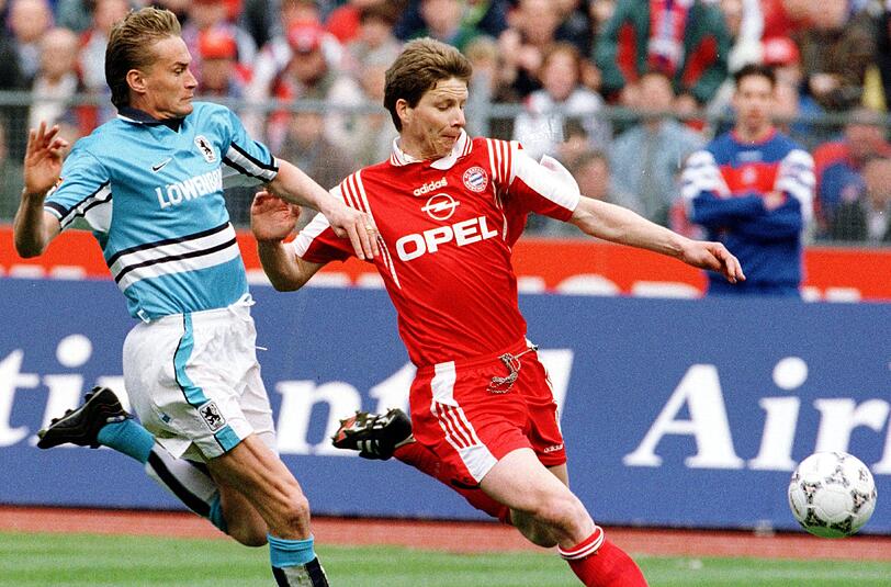 Manni Bender (links), hier im Laufduell mit Michael Tarnat, spielte unter anderem für 1860 München und den FC Bayern.