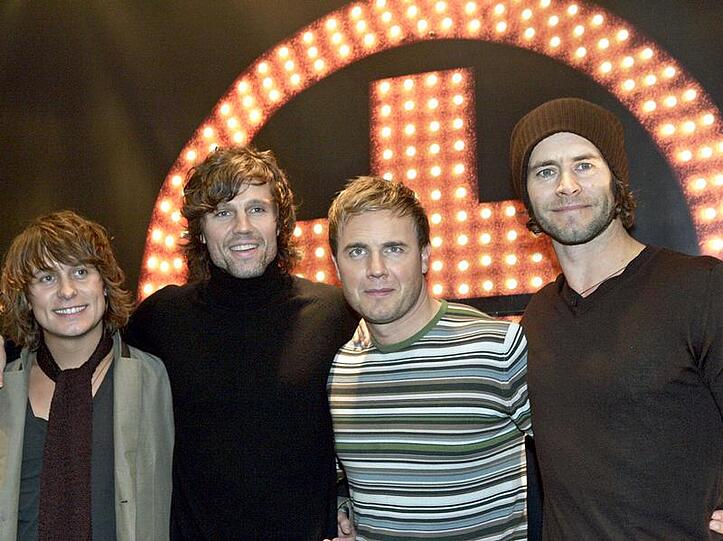 Die restlichen vier Mitglieder Mark Owen, Gary Barlow,  Howard Donald und Jason Orange