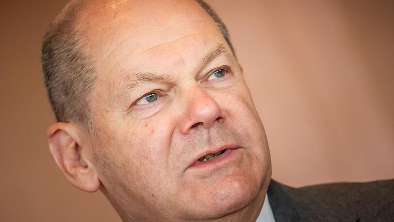 Bundeskanzler Olaf Scholz (SPD) spricht.
