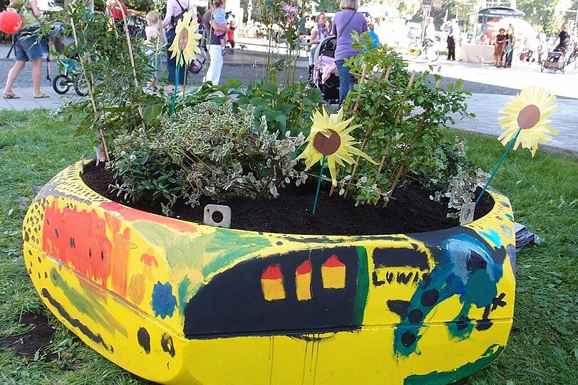 So hatten die Kinder die "Mini"-Gärten bemalt, die am Candidplatz am "Parking Day" aufgestellt wurden.