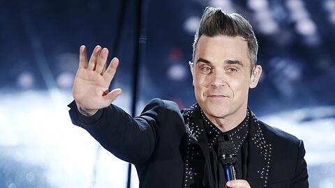 Robbie Williams, hier auf einem Konzert in Italien, spricht darüber, dass ein Auftragsmörder ihn umbringen sollte.