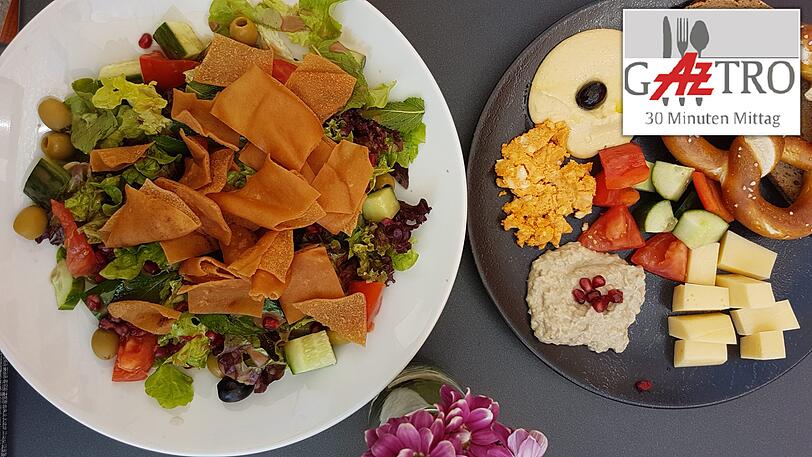 Die bayerisch-arabische Brotzeitplatte und der Fattoush-Salat.