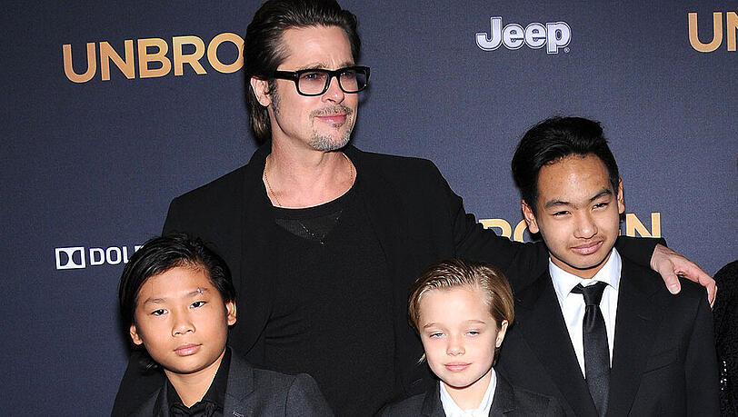 Pax (v.l.n.r.), Brad Pitt, Shiloh und Maddox bei einer Premierenparty im Jahr 2015. Pax (v.l.n.r.), Brad Pitt, Shiloh und Maddox bei einer Premierenparty im Jahr 2015.