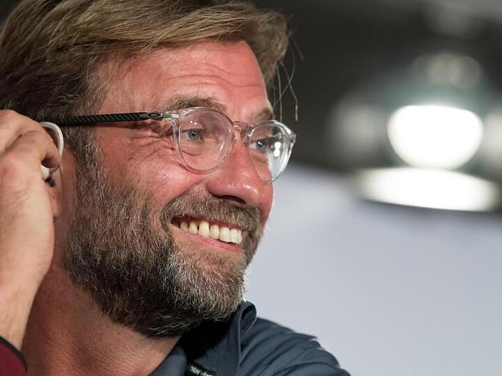 Jürgen Klopp lächelt. Foto: Sven Hoppe/Archiv