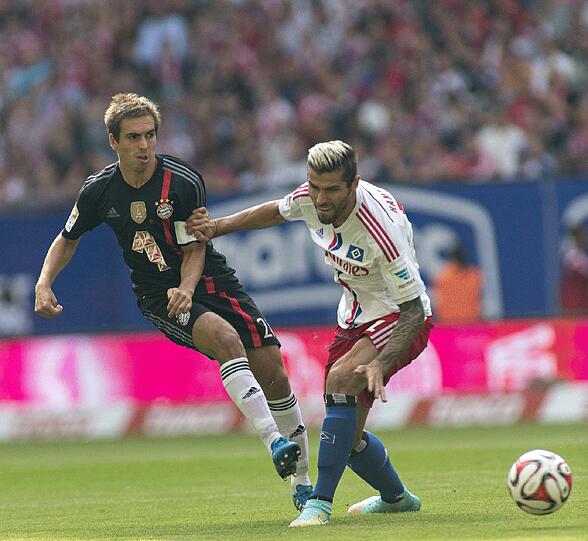 Müssen nach dem enttäuschenden HSV-Remis gegen den Tabellenführer ran: Philipp Lahm und seine Bayern.