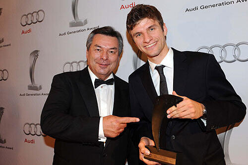 Thomas Müller mit Laudator Waldemar Hartmann.
