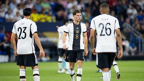 Enttäuschung beim DFB-Team: Emre Can (l-r), Leon Goretzka und Malick Thiaw.