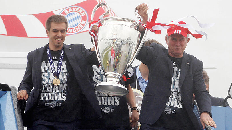 Philipp Lahm (links) und Jupp Heynckes feierten 2013 als Kapitän und Trainer des FC Bayern das Triple.