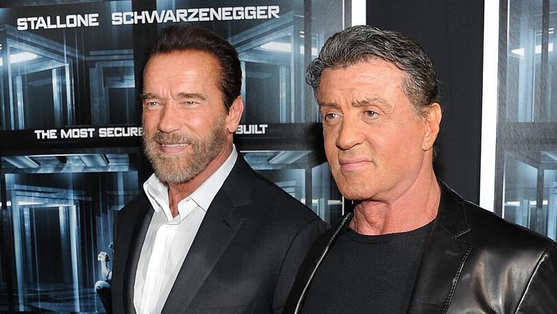 Arnold Schwarzenegger (links) und Sylvester Stallone bei der Premiere von "Escape Plan"