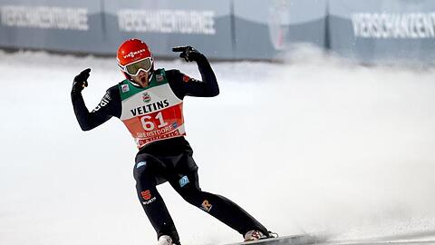 Markus Eisenbichler aus Deutschland reagiert nach dem Sprung.