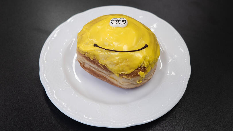 Ein Strahlen am Morgen: der Wimmer-Mango-Krapfen.