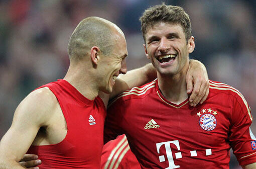 Arjen Robben (l.) und Thomas Müller.