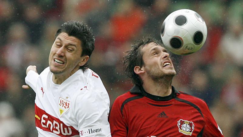 Ciprian Marica (l) vom VfB und der Leverkusener Manuel Friedrich (r) springen zum Ball. Ciprian Marica (l) vom VfB und der Leverkusener Manuel Friedrich (r) springen zum Ball.