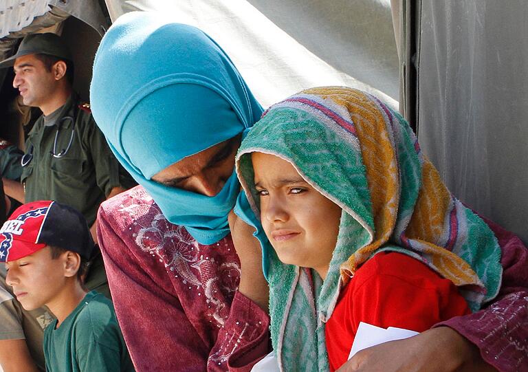 Angst vor Angriffen: Syrische Flüchtlinge in einem Flüchtlingslager an der türkischen Grenze.