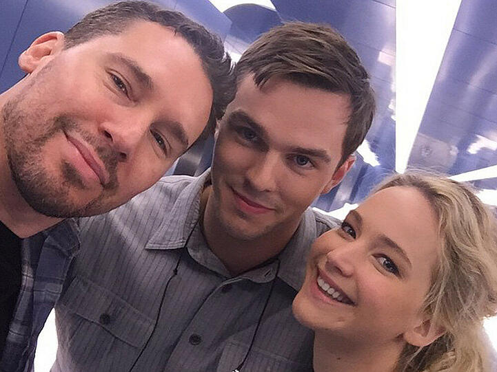 Jennifer Lawrence mit Nicholas Hoult und Regisseur Bryan Singer (v.r.n.l.)