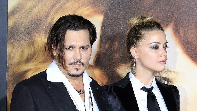 Amber Heard und Johnny Depp lassen sich scheiden Amber Heard und Johnny Depp lassen sich scheiden