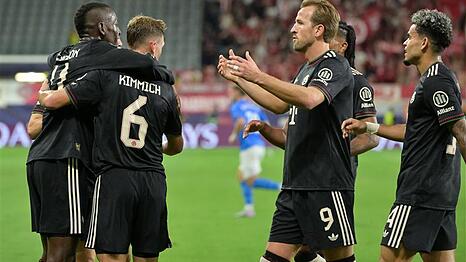 Superstar als erster Gratulant: Harry Kane (r.) beglückwünscht Nicolas Jackson zu seinem ersten Tor im Bayern-Dress.
