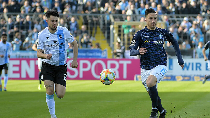 Aaron Berzel behauptet den Ball gegen Mounir Bouziane.