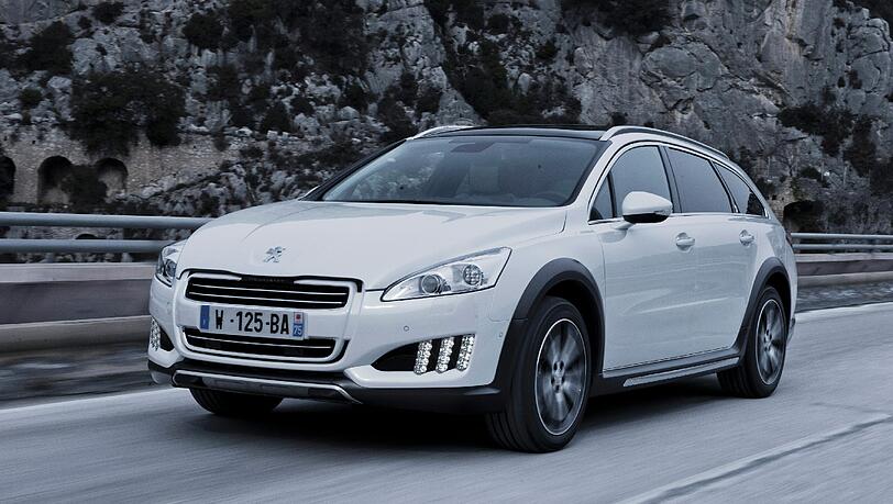 Schick gestylter Technologieträger für den Alltagseinsatz: Der Peugeot 508 RXH ist ein klassischer Crossover mit Diesel-Hybrid. Schick gestylter Technologieträger für den Alltagseinsatz: Der Peugeot 508 RXH ist ein klassischer Crossover mit Diesel-Hybrid.