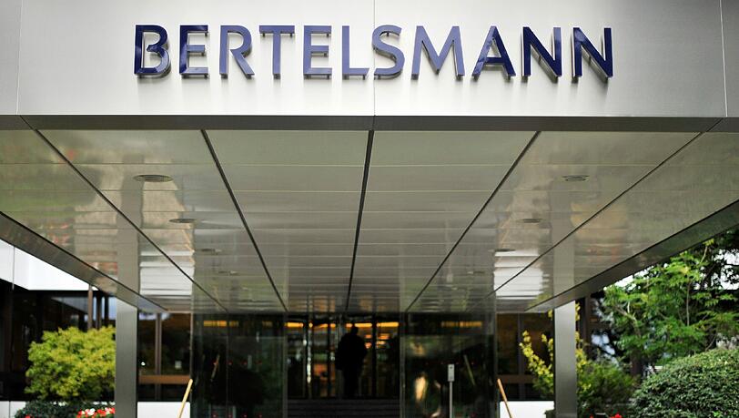 Der Eingang zur Konzernzentrale der Bertelsmann AG in Gütersloh. Foto: Marius Becker Der Eingang zur Konzernzentrale der Bertelsmann AG in Gütersloh. Foto: Marius Becker